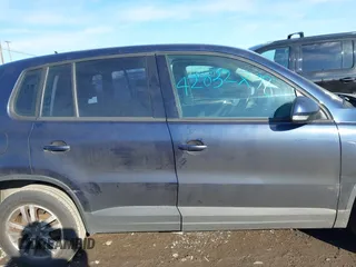 2014 Volkswagen Tiguan SE z VIN WVGAV3AX7EW541355, wystawiony jako IAAI lot #42032798 z przebiegiem 220 940 mil mil oraz . Historia ofert i sprzedaży dostępna na DreamBid. Obrazek 13.