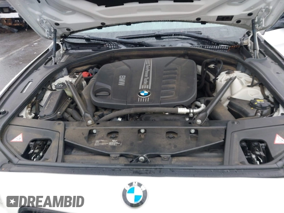 2014 BMW 5 Series 535d with VIN WBAXA5C58ED690612, listed as a IAAI auction lot 41570616 with 95,124 mi miles and . Bid and sale history available at carsss.com. Image 10.