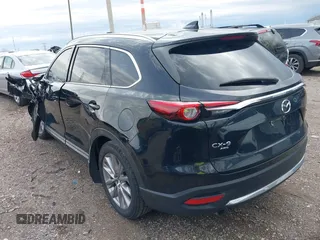 2020 Mazda CX-9 Grand Touring with VIN JM3TCBDY3L0419049, listed as a IAAI auction lot 41948393 with 70,163 mi miles and . Bid and sale history available at DreamBid. Image 3.