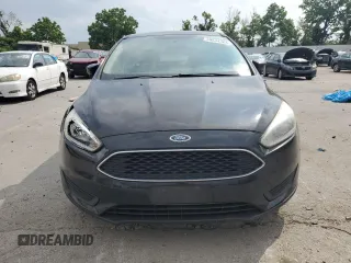 2016 Ford Focus SE z VIN 1FADP3F20GL281772, wystawiony jako Copart lot #59544365 z przebiegiem 166 189 mil mil oraz Czysty tytuł • Clean title. Historia ofert i sprzedaży dostępna na DreamBid. Obrazek 5.