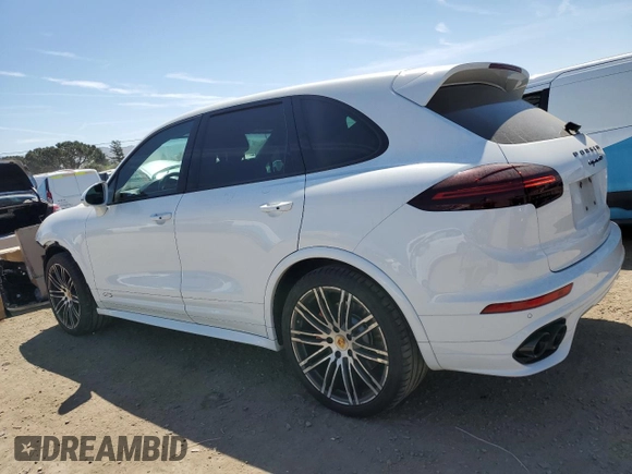 2016 Porsche Cayenne GTS with VIN WP1AD2A20GLA76054, listed as a Copart auction lot 55176615 with 54,274 mi miles and Salvage title. Bid and sale history available at DreamBid. Image 2.