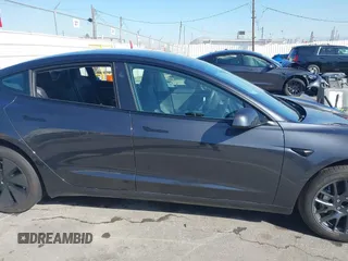 2024 Tesla Model 3 with VIN 5YJ3E1EA7RF717855, listed as a IAAI auction lot 41838814 with 8,750 mi miles and . Bid and sale history available at DreamBid. Image 13.
