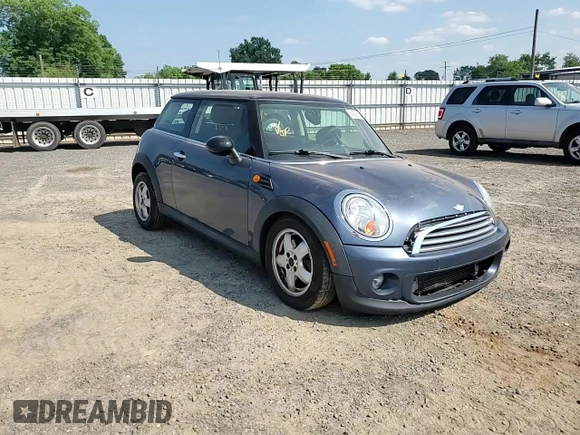 2011 MINI Hardtop with VIN WMWSU3C54BT184251, listed as a Copart auction lot 59298135 with 123,864 mi miles and Salvage title. Bid and sale history available at DreamBid. Image 13.