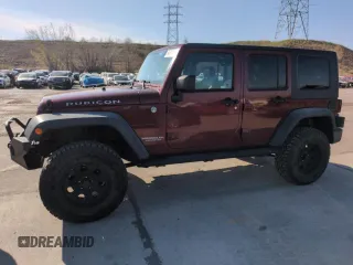 2010 Jeep Wrangler Unlimited Rubicon with VIN 1J4BA6H13AL140902, listed as a Copart auction lot 54335455 with 118,423 mi miles and Clean title. Bid and sale history available at DreamBid. Image 1.