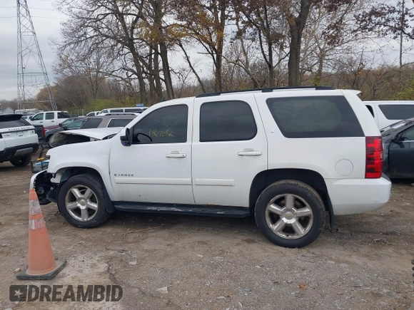 2008 Chevrolet Tahoe LTZ with VIN 1GNFK13098J160218, listed as a IAAI auction lot 40876511 with 186,701 mi miles and . Bid and sale history available at DreamBid. Image 14.