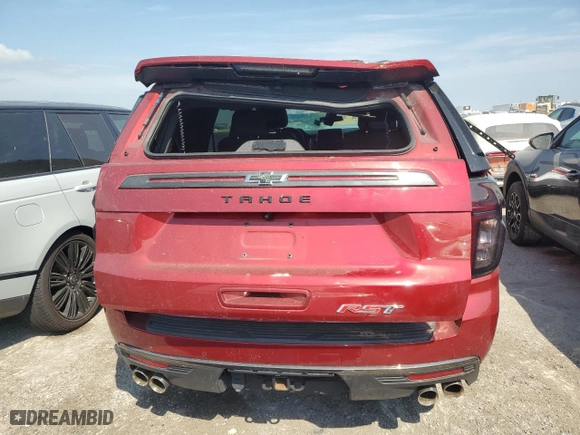 2022 Chevrolet Tahoe RST with VIN 1GNSKRKLXNR128058, listed as a Copart auction lot 76407744 with 0 mi miles and Salvage Title. Bid and sale history available at carsss.com. Image 6.