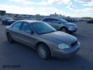 2002 Mercury Sable GS with VIN 1MEFM50U12A634444, listed as a IAAI auction lot 40588478 with 153,255 mi miles. Bid and sale history available at carsss.com. Image 1.