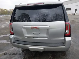 2015 GMC Yukon SLT with VIN 1GKS2BKC0FR676107, listed as a IAAI auction lot 41962929 with 132,389 mi miles. Bid and sale history available at carsss.com. Image 17.
