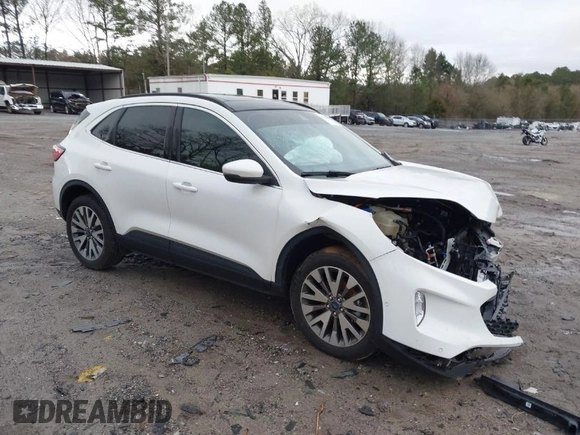 2020 Ford Escape Titanium Hybrid with VIN 1FMCU9DZ0LUC56274, listed as a IAAI auction lot 41256530 with 43,502 mi miles and . Bid and sale history available at DreamBid. Image 1.