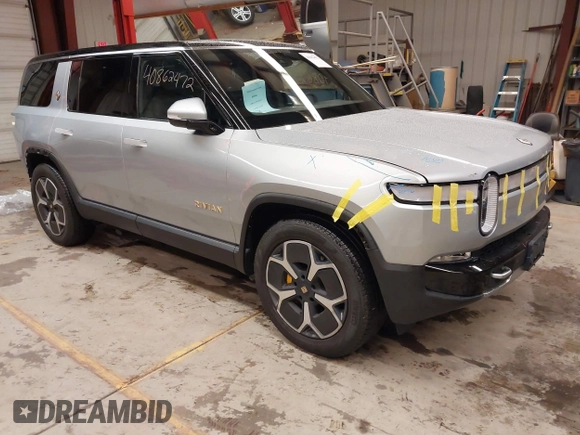 2024 Rivian R1S Adventure with VIN 7PDSGABA9RN039601, listed as a IAAI auction lot 40862472 with 6,186 mi miles. Bid and sale history available at carsss.com. Image 1.