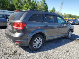 2014 Dodge Journey SXT with VIN 3C4PDCBG4ET211324, listed as a Copart auction lot 53255785 with 187,126 mi miles and Salvage Title. Bid and sale history available at carsss.com. Image 3.
