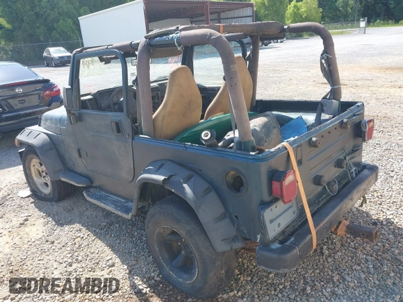 1998 Jeep Wrangler Sport with VIN 1J4FY19S2WP710055, listed as a IAAI auction lot 42680216 with Not provided miles and . Bid and sale history available at DreamBid. Image 3.
