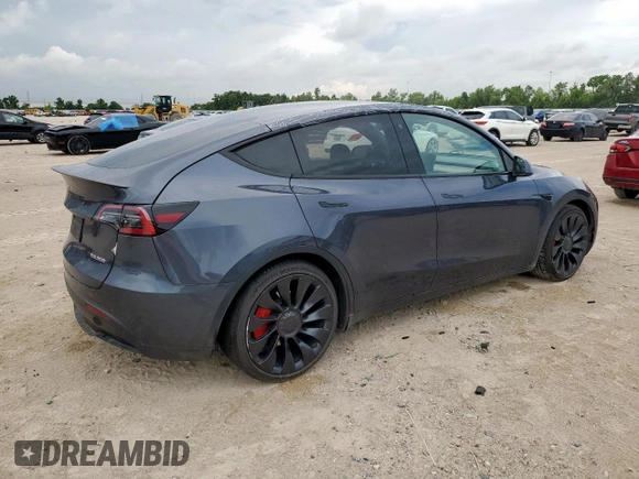 2022 Tesla Model Y Performance with VIN 7SAYGDEF1NF535286, listed as a Copart auction lot 62082545 with 16,387 mi miles and Salvage title. Bid and sale history available at DreamBid. Image 3.