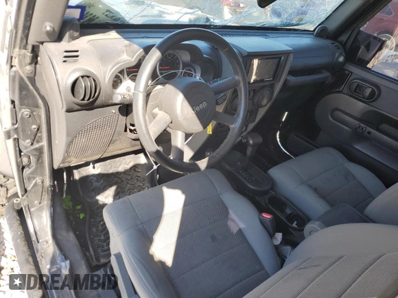 2008 Jeep Wrangler Rubicon with VIN 1J4GA64178L632855, listed as a Copart auction lot 49717905 with 92,031 mi miles and Salvage title. Bid and sale history available at DreamBid. Image 8.