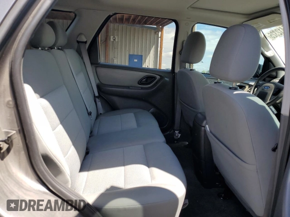 2006 Ford Escape XLT z VIN 1FMCU03186KA78489, wystawiony jako Copart lot #55412325 z przebiegiem 144 243 mil mil oraz Szkoda całkowita • Salvage title. Historia ofert i sprzedaży dostępna na DreamBid. Obrazek 11.