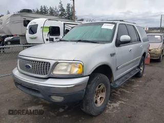 1999 Ford Expedition XLT z VIN 1FMPU18L7XLA72471, wystawiony jako IAAI lot #41604688 z przebiegiem 288 349 mil mil oraz . Historia ofert i sprzedaży dostępna na DreamBid. Obrazek 2.