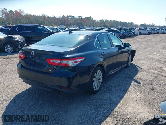2020 Toyota Camry LE with VIN 4T1C11AK9LU985116, listed as a IAAI auction lot 40798999 with 53,390 mi miles. Bid and sale history available at carsss.com. Image 4.