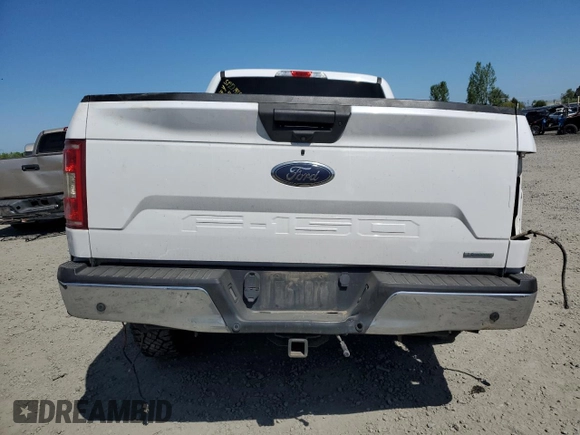 2018 Ford F-150 XL with VIN 1FTFW1EG6JKE41335, listed as a Copart auction lot 53473855 with 138,113 mi miles and Salvage title. Bid and sale history available at DreamBid. Image 6.