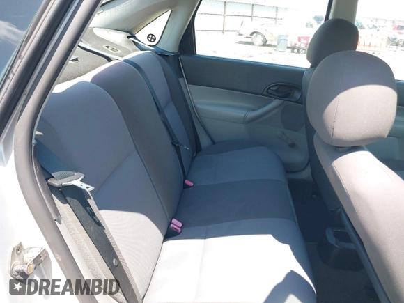 2007 Ford Focus S z VIN 1FAFP34N57W109953, wystawiony jako IAAI lot #42225399 z przebiegiem Nie podano mil oraz . Historia ofert i sprzedaży dostępna na DreamBid. Obrazek 8.