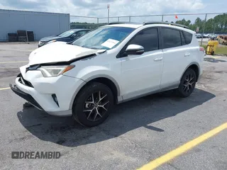 2017 Toyota RAV4 SE with VIN 2T3JFREV7HW637809, listed as a IAAI auction lot 42472464 with 173,273 mi miles and . Bid and sale history available at DreamBid. Image 2.