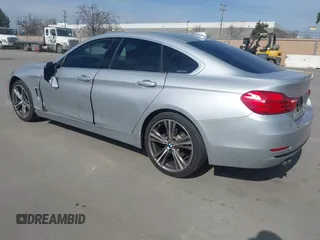 2016 BMW 4 Series 428i with VIN WBA4A9C55GG695469, listed as a IAAI auction lot 41753857 with 90,692 mi miles. Bid and sale history available at carsss.com. Image 3.