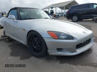 2002 Honda S2000 z VIN JHMAP11492T004927, wystawiony jako IAAI lot #42062377 z przebiegiem 117 612 mil mil oraz . Historia ofert i sprzedaży dostępna na DreamBid. Obrazek 1.