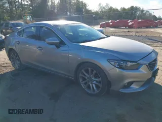 2014 Mazda 6 i Touring with VIN JM1GJ1T59E1103766, listed as a IAAI auction lot 41342645 with 172,307 mi miles and . Bid and sale history available at DreamBid. Image 1.