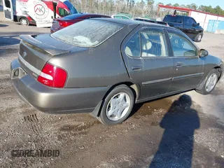 2000 Nissan Altima XE with VIN 1N4DL01D8YC235627, listed as a IAAI auction lot 41662564 with 79,409 mi miles. Bid and sale history available at carsss.com. Image 4.