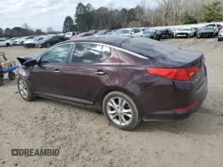 2013 Kia Optima LX z VIN 5XXGM4A7XDG129700, wystawiony jako Copart lot #47581035 z przebiegiem 121 247 mil mil oraz Szkody całkowita. Historia ofert i sprzedaży dostępna na DreamBid. Obrazek 2.