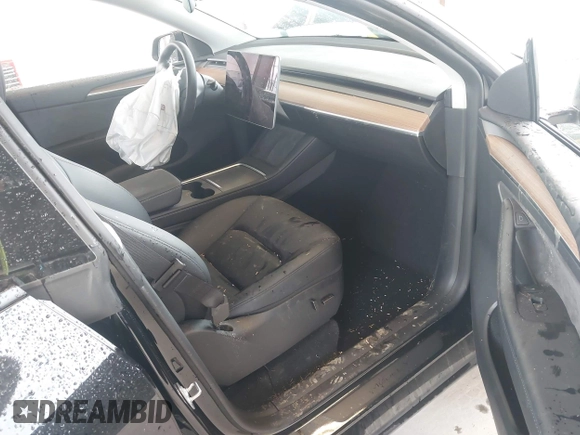 2023 Tesla Model Y Long Range with VIN 7SAYGDEE0PF909610, listed as a IAAI auction lot 41906081 with 20,656 mi miles and . Bid and sale history available at DreamBid. Image 5.