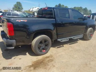 2018 Chevrolet Colorado 4WD LT with VIN 1GCGTCEN9J1104011, listed as a IAAI auction lot 41876694 with 72,912 mi miles. Bid and sale history available at carsss.com. Image 4.
