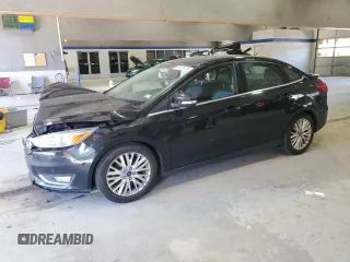 2016 Ford Focus Titanium с VIN 1FADP3J29GL282880, выставлен на аукционе Copart как лот 55479725 с пробегом 71 600 миль миль и Чистый • Clean title. История ставок и продаж доступна на DreamBid. Изображение 1.