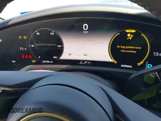 2023 Porsche Taycan GTS z VIN WP0AD2Y13PSA48028, wystawiony jako IAAI lot #41752927 z przebiegiem 22 196 mil mil oraz . Historia ofert i sprzedaży dostępna na DreamBid. Obrazek 7.