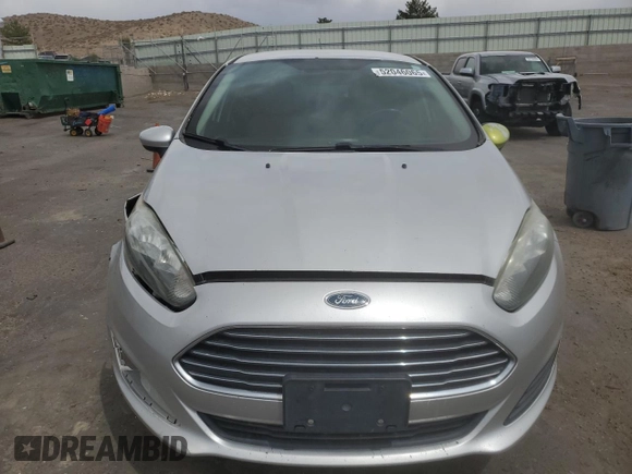 2014 Ford Fiesta SE z VIN 3FADP4BJ8EM133030, wystawiony jako Copart lot #52046065 z przebiegiem 113 792 mil mil oraz Szkoda całkowita • Salvage title. Historia ofert i sprzedaży dostępna na DreamBid. Obrazek 5.