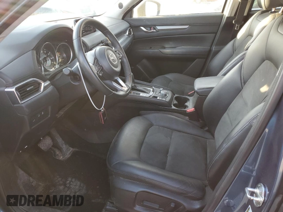 2020 Mazda CX-5 Touring with VIN JM3KFBCM9L0737243, listed as a Copart auction lot 46908495 with 76,956 mi miles and Salvage Title. Bid and sale history available at carsss.com. Image 7.