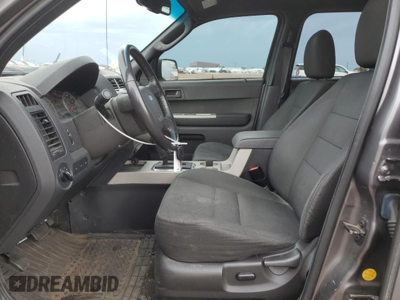 2012 Ford Escape XLT with VIN 1FMCU9DG6CKB43438, listed as a Copart auction lot 58499905 with 179,911 mi miles and Salvage title. Bid and sale history available at DreamBid. Image 7.
