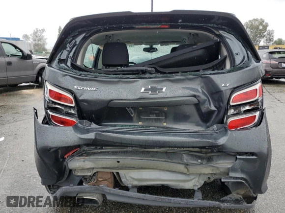 2018 Chevrolet Sonic LT z VIN 1G1JD6SGXJ4100342, wystawiony jako Copart lot #49188795 z przebiegiem 92 254 mil mil oraz Szkoda całkowita • Salvage title. Historia ofert i sprzedaży dostępna na DreamBid. Obrazek 6.