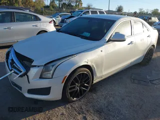 2014 Cadillac ATS Standard RWD z VIN 1G6AA5RA7E0128501, wystawiony jako IAAI lot #41780110 z przebiegiem 78 367 mil mil oraz . Historia ofert i sprzedaży dostępna na DreamBid. Obrazek 17.