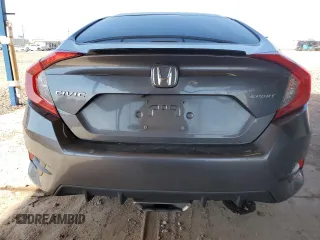 2021 Honda Civic Sport with VIN 19XFC2F80ME003634, listed as a Copart auction lot 52317715 with 69,411 mi miles and Salvage Title. Bid and sale history available at DreamBid. Image 6.