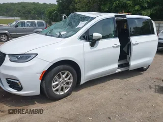 2023 Chrysler Pacifica Touring L with VIN 2C4RC1BGXPR531396, listed as a IAAI auction lot 42492340 with Not provided miles and . Bid and sale history available at DreamBid. Image 17.