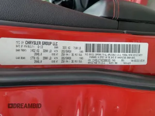 2013 Dodge Durango R/T with VIN 1C4SDJCTXDC688165, listed as a Copart auction lot 61071195 with 139,075 mi miles and Salvage title. Bid and sale history available at DreamBid. Image 14.