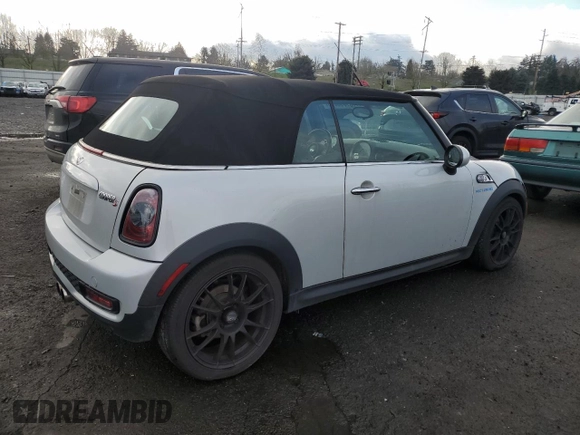 2013 MINI Convertible S with VIN WMWZP3C55DT297215, listed as a Copart auction lot 87995095 with Not provided miles and Salvage title. Bid and sale history available at DreamBid. Image 3.