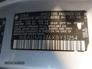 1999 BMW 5 Series 528iA with VIN WBADM6336XBY31254, listed as a IAAI auction lot 41408089 with 221,176 mi miles. Bid and sale history available at carsss.com. Image 9.