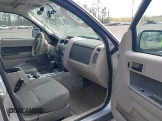 2009 Ford Escape Hybrid with VIN 1FMCU593X9KA36061, listed as a IAAI auction lot 42060150 with 183,184 mi miles. Bid and sale history available at carsss.com. Image 5.