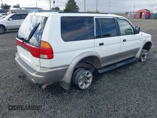1998 Mitsubishi Montero Sport LS with VIN JA4MT31P3WP025054, listed as a IAAI auction lot 41880704 with 381,966 mi miles. Bid and sale history available at carsss.com. Image 4.