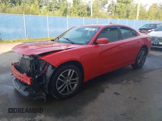 2019 Dodge Charger SXT with VIN 2C3CDXJGXKH611601, listed as a Copart auction lot 71523354 with 133,178 mi miles and Clean Title. Bid and sale history available at DreamBid. Image 1.