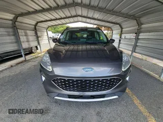 2020 Ford Escape Titanium Hybrid with VIN 1FMCU0DZXLUB82146, listed as a IAAI auction lot 42679247 with 112,299 mi miles and . Bid and sale history available at DreamBid. Image 1.