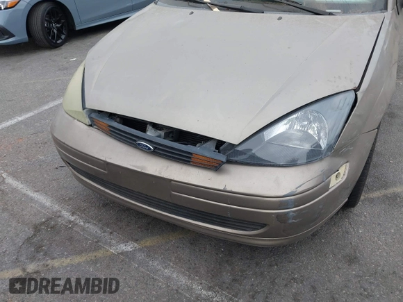 2003 Ford Focus SE z VIN 1FAFP34Z73W236474, wystawiony jako IAAI lot #39378102 z przebiegiem 183 280 mil mil oraz . Historia ofert i sprzedaży dostępna na DreamBid. Obrazek 12.