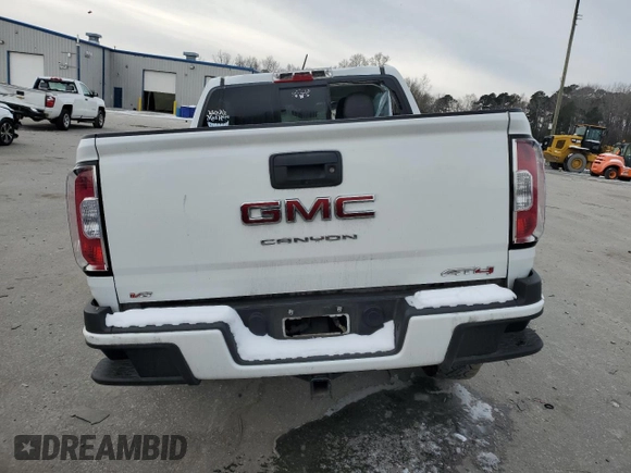 2022 GMC Canyon 4WD AT4 w/Cloth with VIN 1GTG6FEN5N1155598, listed as a Copart auction lot 41970495 with 57,572 mi miles and Salvage Title. Bid and sale history available at carsss.com. Image 6.