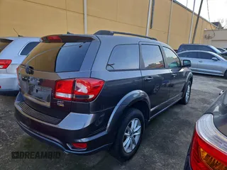 2017 Dodge Journey SXT with VIN 3C4PDCBG4HT533952, listed as a Copart auction lot 82472614 with 155,060 mi miles and Clean Title. Bid and sale history available at DreamBid. Image 4.